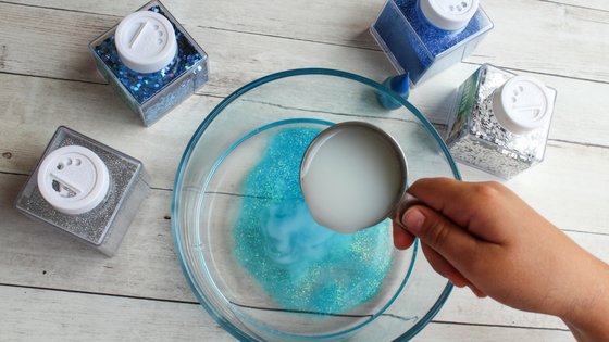 We made this Ocean Slime at the request of my son and they had a blast with it! Borax Free so it's totally safe for the kids. #slime #dolphins #oceanslime #homeschool #frugalnavywife | Slime Recipes | Homeschooling Activities | Dolphins Themed Activities | Ocean Themed Activities
