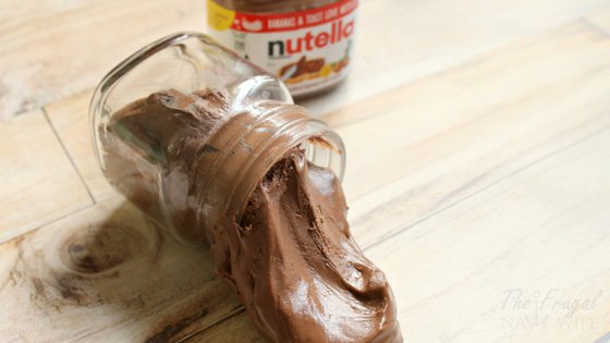 This edible Nutella Slime only takes 2 ingredients and my kids swear it tastes like a Nutella Marshmellow. No joke. Make it yourself today. #nutella #slime #edibleslime #slimerecipe #frugalnavywife | Slime Recipes | Edible Slime | Nutella Recipes |