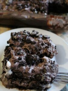Oreo Dirt Pie is the most addicting thing in the world. Don't Believe me? Give it a try. This pie will leave you wanting more so make 2 just in case. #oreo #pie #chocolate #dessert #frugalnavywife | Dessert Recipes | Oreo Recipes | Pie Recipes | Chocolate Recipes