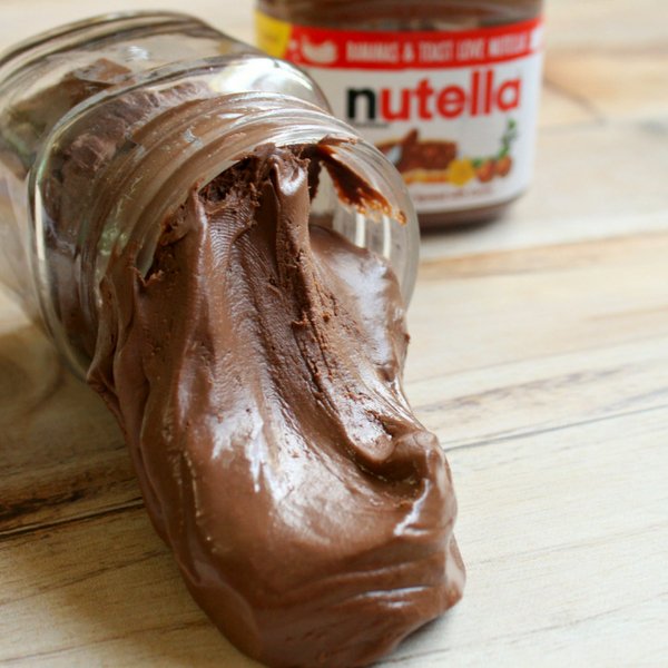 This edible Nutella Slime only takes 2 ingredients and my kids swear it tastes like a Nutella Marshmellow. No joke. Make it yourself today. #nutella #slime #edibleslime #slimerecipe #frugalnavywife | Slime Recipes | Edible Slime | Nutella Recipes |