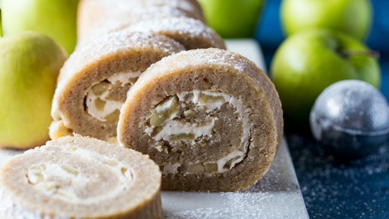 This Apple Cake Roll recipe is a fall crowd pleaser. Its the perfect apple dessert recipe for your holiday parties and easy to make. #applerecipe #applecake #desserts #frugalnavuwife | Apple Desserts | Fall Recipes | Apple Cake Recipes | Apple Roll Recipes | Apple Recipes
