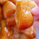 A simple customizable recipe for all occasions. This Paula Deen Monkey Bread is just the dessert recipe you need for your next gathering. #pauladeen #copycatrecipe #monkeybread #frugalnavywife | Monkey Bread Recipes | Paula Deen Recipes | Copycat Recipe | Dessert Recipe