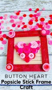 This Popsicle Stick Frame will make a great Valentine's Day gift for parents and grandparents. Change the colors on this craft to make it for any holiday. #frugalnavywife #valentinesday #popsiclestickcraft #buttoncrafts #craftsforkids #giftidea | Popsicle Stick Crafts | Button Crafts | Easy Crafts for Kids | Valentine's Day Crafts | Gift Ideas