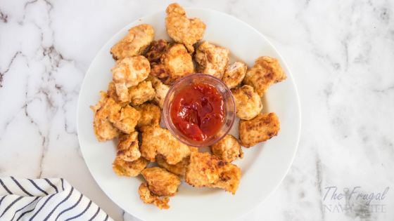 If your family loves Chick Fil A as much as mine you are probably looking for this Copycat Chick Fil A Chicken Nuggets Recipe. You can't tell it's a copycat! #thefrugalnavywife #copycatrecipe #chickfila #nuggets #chickfilarecipe #easyrecipe | Easy Weeknight Meal | Easy Recipe | Yummy Recipes | Copycat Recipe | Chick Fil A Recipe | Lunch Recipe | Chick Fil A Nuggets Recipe