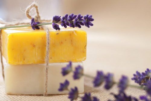 handmade soap bars with lavender flowers, shallow DOF