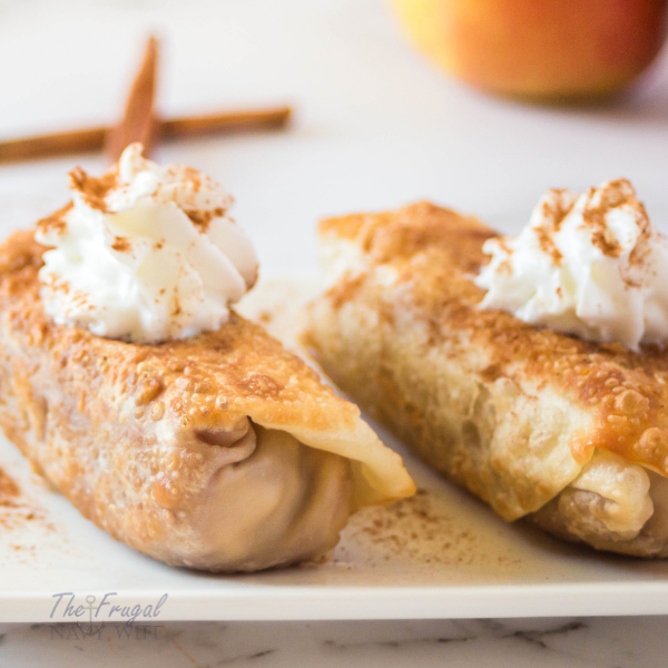 The traditional flavor of apple pie filling wrapped up in a crunchy shell. These apple pie egg rolls are an ideal fall afternoon treat. #applepierecipes #eggrolls #frugalnavywife #fallrecipes #thanksgiving | Thanksgiving Dessert | Fall Desserts | Apple Recipes | Apple Pie Recipes |