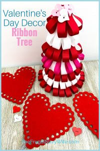 Perfect to use up old supplies you may have laying around! Make these Valentine's Day Ribbon Tree for the kids! #frugalnavywife #valentinesday #valentinesdaydecorations #easyvalentinecrafts #valentinesdaycrafts #frugaldiy #frugaldecorations | Valentine's Day Crafts | Easy Crafts for Kids | Ribbon Tree Crafts | Valentine's Day Decorations | Frugal Home Decor |