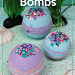 If you're looking for a good bath bomb recipe, you need this Homemade Mermaid Bath Bombs recipe in your life. So easy to make and fun to play with! #bathbombs #frugalnavywife #DIYbathbombs | Bathtime | Bath Bomb Addict | Bath Bomb | Bath Bombs | Bath Bombs for Days | Bath Art | Kids Activities | Homemade Bath Bombs | How to make Bath Bombs | Bth Fizzies