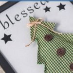 You can never have too much Christmas decor! This Blessed Christmas Tree Cricut Craft would be the perfect new addition to add to your collection. #christmasdecor #holiday #christmastree #frugalnavywife #blessed | Blessed Christmas Tree | Holiday Decor | Christmas Decorations | Simple Decor Ideas | Cricut Craft |