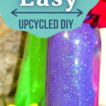 A simple and easy way to glam up your home decor on a budget. These glitter jars are easily customized and perfect for any season. #frugaldiy #homedecor #frugalnavywife #upcycledcrafts #recycledmaterials | Upcycled Crafting | Glitter Jars | Home Decor | DIY Craft | Budget Decor |